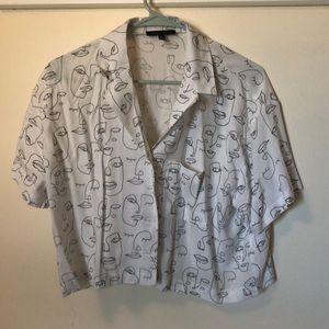 White cropped button down shirt, with line face drawing